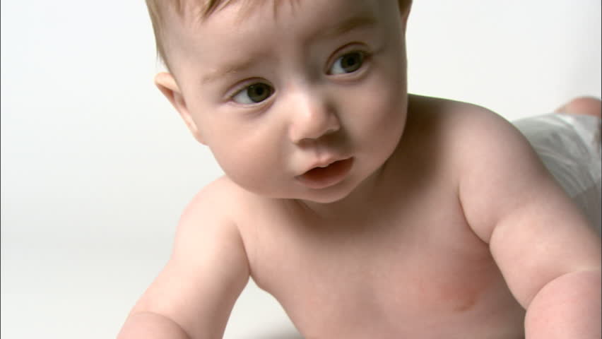 Closeup of baby lying on his stomach