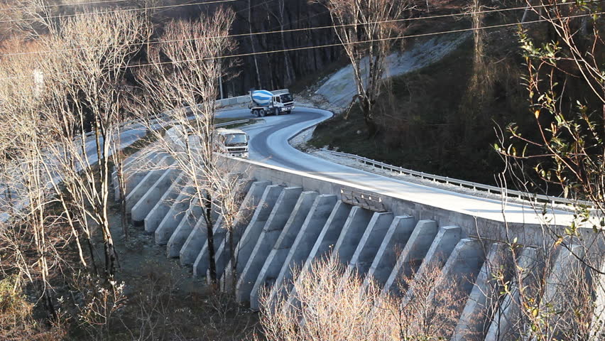 Winding road. Car on a bend.