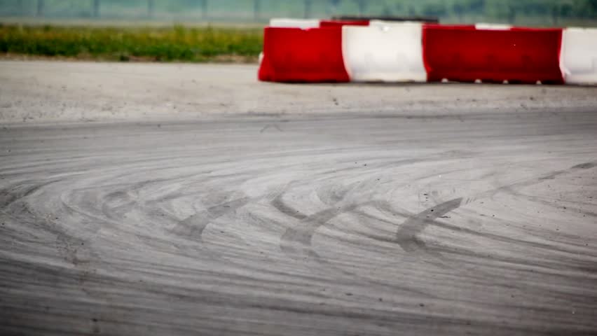 MOSCOW - JUN 11: Racing cars enter into closeup turn, on 3rd stage of championship on drift Megafon-RDS 2011, on Jun 11, 2011 in Moscow, Russia