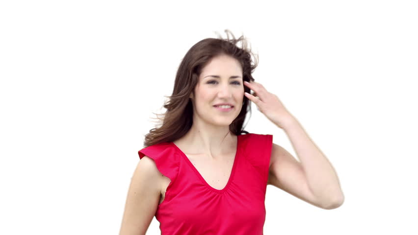 Woman jumping energetically against a white background