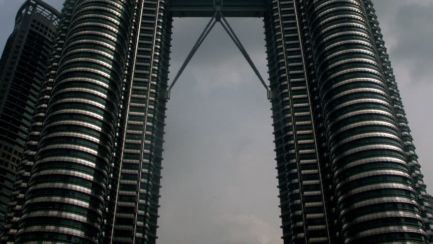 KUALA LUMPUR, MALAYSIA. CIRCA 2010. Timelapse tilt up of Petronas Twin Towers, Kuala Lumpur, Malaysia.