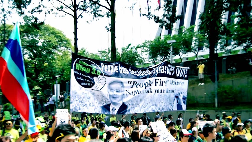 KUALA LUMPUR - APRIL 28: Protestors march during the Bersih 3.0 rally in Kuala Lumpur, Malaysia on April 28, 2012. The rally was organized by Coalition for Clean and Fair Elections to protest what they perceived as insincere election reforms.