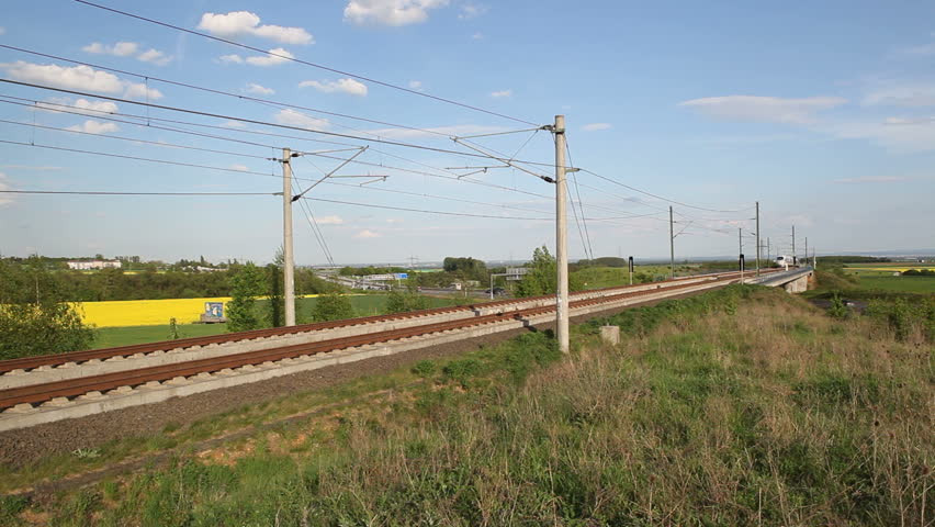 WALLAU, GERMANY â MAY 4: A passing german highspeed train (ICE) on the Frankfurt-Cologne line on May 4, 2012 near Wallau, Germany. The maximum speed of these highspeed trains is around 320km/h.