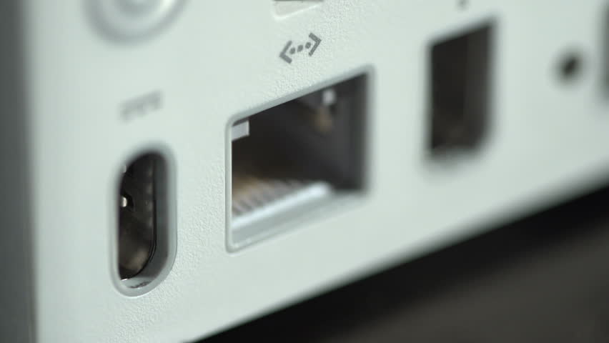 Close up of ethernet cable being plugged in