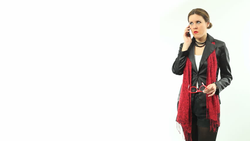 Bossy woman in black criticizing someone over the phone