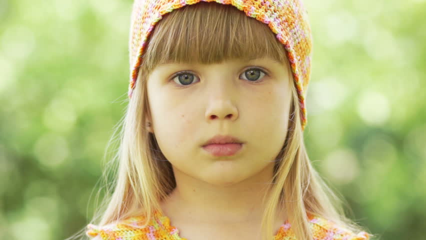 Little girl shows tongue
