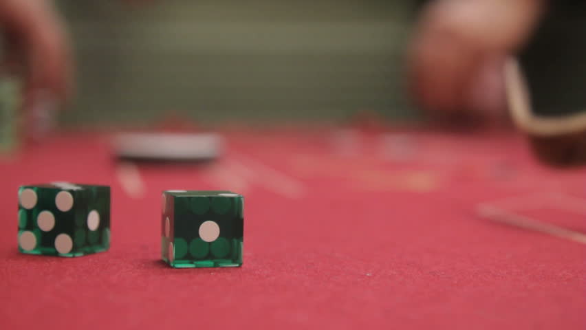 Close up of dice on a crap table