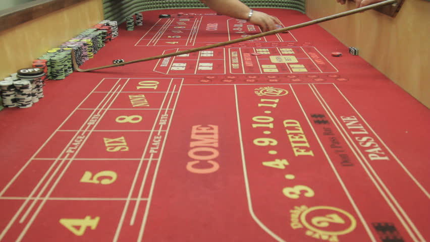 View of a crap table with people making bets