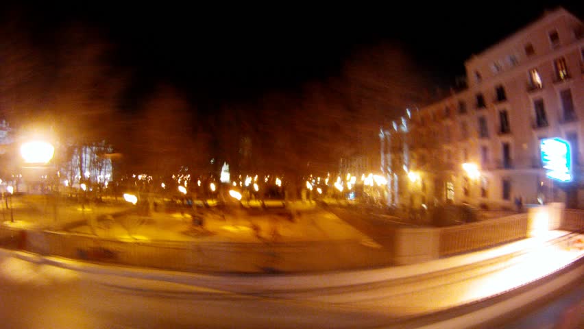 MADRID - MAR 10: (Timelapse View) Bus go along Stree Gran Via at night, on Mar 10, 2012 in Madrid, Spain