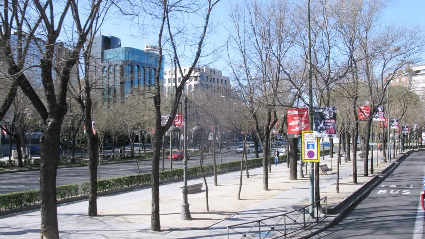 MADRID - MAR 11: (Timelapse View) Bus go around city in afternoon, on Mar 11, 2012 in Madrid, Spain