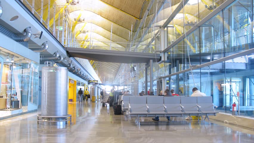 MADRID - MAR 12: (Timelapse View) Passengers expect flight in airport building Barahas, on Mar 12, 2012 in Madrid, Spain
