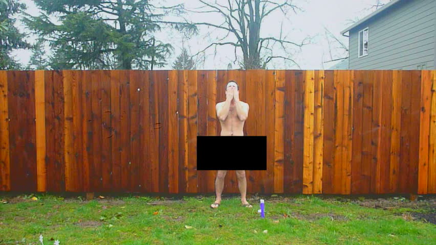 Naked man with censor bar walks into frame and showers in rainstorm advertisement.