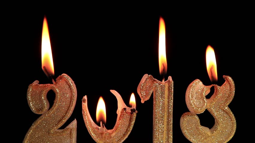 Happy New Year 2013, candles burning, time lapse, reversing

