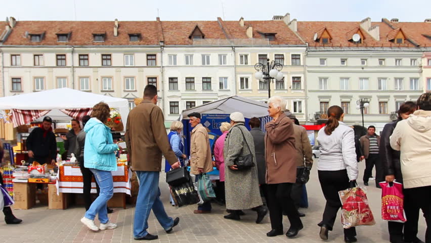 IVANO-FRANKIVSK, UKRAINE - APRIL 12: People on traditional fair before Easter in city center on April 12, 2012 in Ukraine, Ivano-Frankivsk. Easter is most cheerful holiday for orthodox believers.