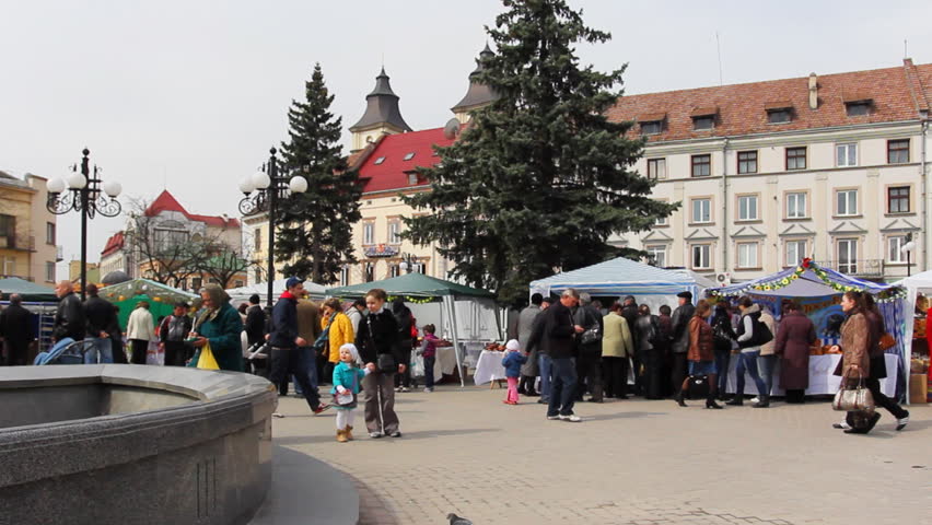 IVANO-FRANKIVSK, UKRAINE - APRIL 12: Trade Fair before Easter near fountain Egg on April 12, 2012 in Ukraine, Ivano-Frankivsk. Easter celebrated on each first week after vernal equinox and full moon