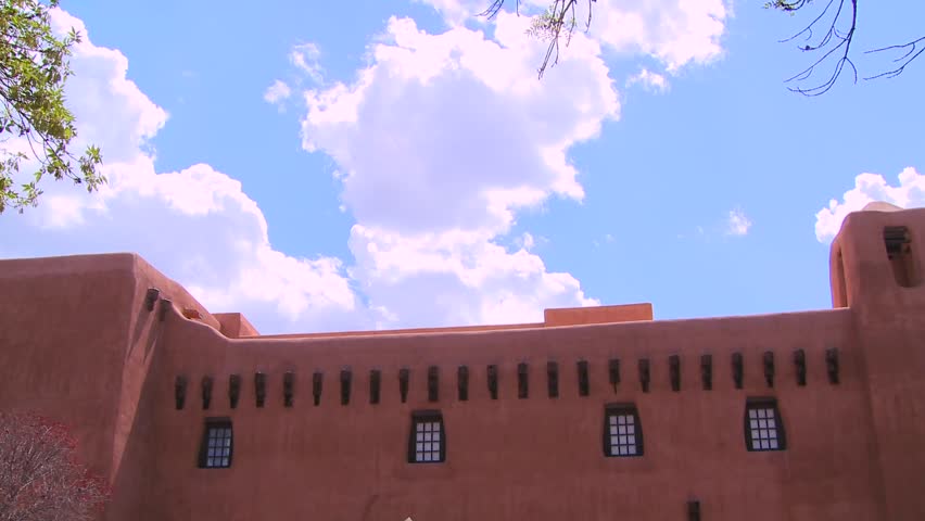 Red clay building in the Southwestern United States time lapse
