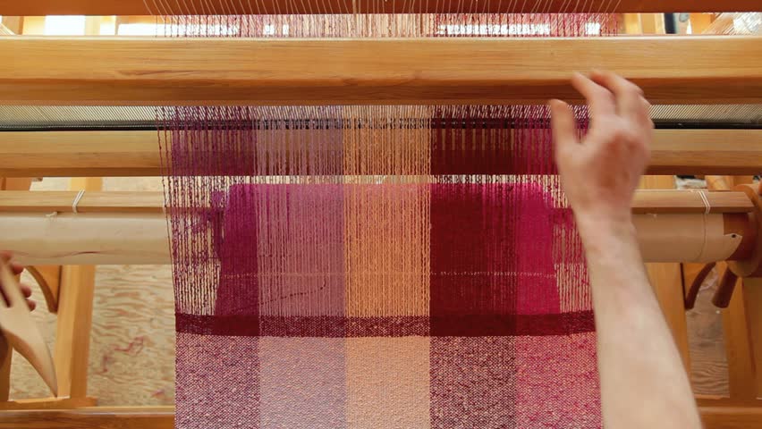 Weaving tea towels on a loom