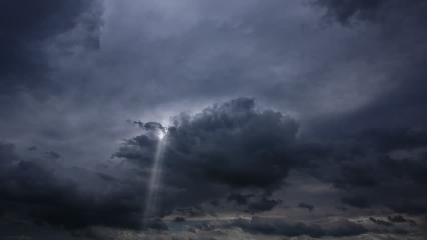 Timelapse of Clouds and Stormy Night with sun rays 1080P. Loop at 1920x1080