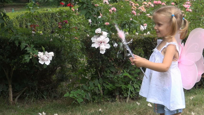 Child Playing with her Fairy Wand, Child Pretending to Be A Fairy Flowers