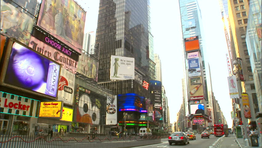 New York, NY - CIRCA 2006: Traffic goes down the street in Times Square during the day, when it is least crowded