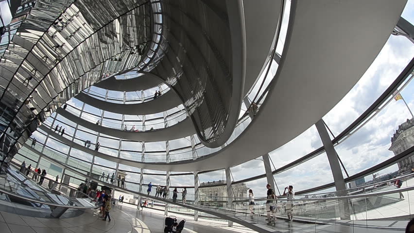 BERLIN - JUNE 10: People move inside the Cupola of the Reichstag building on June 10, 2012 in Berlin, Germany.
