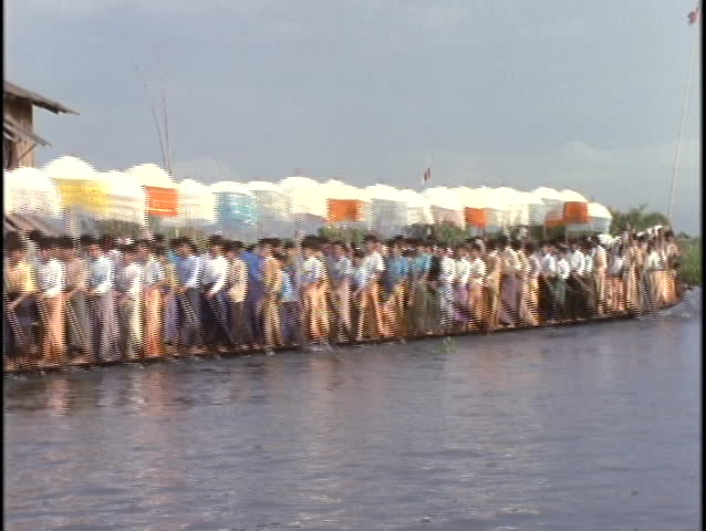 BURMA - CIRCA 1990S: The Duanwu Festival, also known as the Long Boat Festival, is celebrated by men and women in Burma in the late 1990s