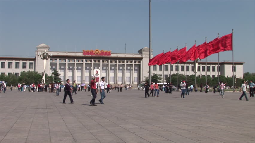 Beijing, China - CIRCA May, 2007: People walking around Tiananmen Square with the National Museum of China in the background