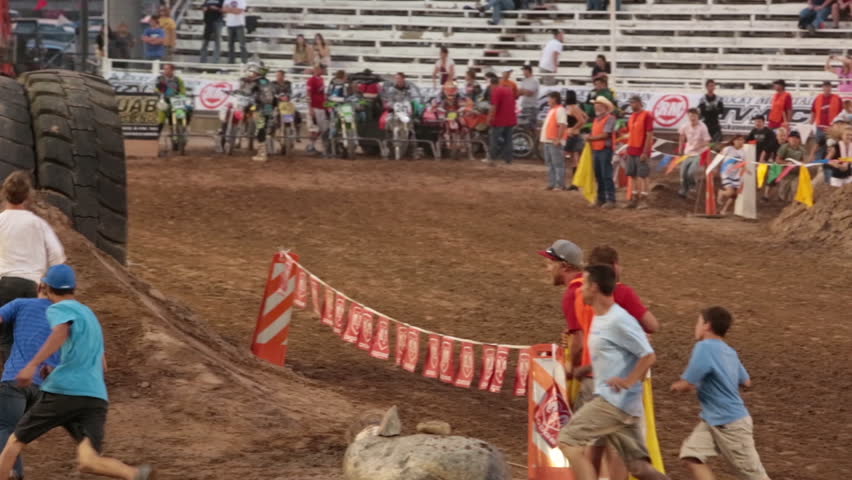 NEPHI, JUAB, UTAH 30 JUN 2012: Annual rural event where people run the obstacle course people at Juab County extreme enduro. Economic and team building ties to community.