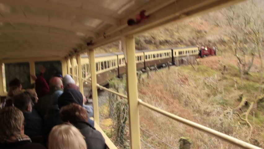 ABERYSWYTH, CEREDIGION/WALES - APRIL 7: Unidentified tourists take the steam train along the Vale of Rheidol on April 7, 2012 in Aberystwyth. The train travels between Devils Bridge and Aberystwyth. 