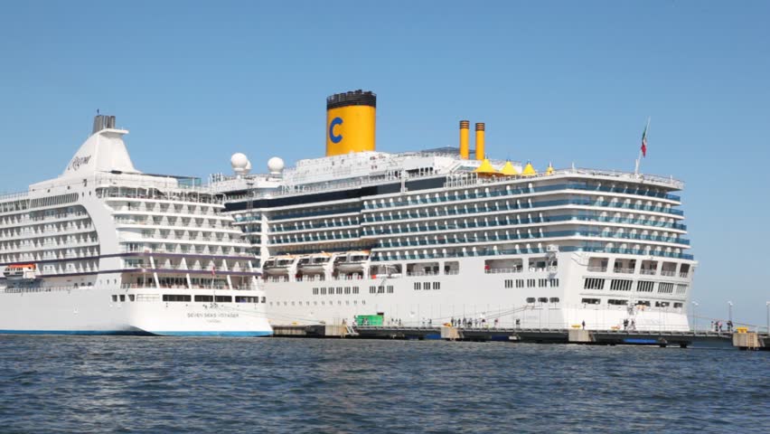ESTONIA, TALLINN - AUGUST 1: Two huge passenger liners Costa Luminosa and Seven Seas Voyager stand on mooring port in August 1, 2011 in Tallinn, Estonia. Tallinn seaport is consisting of five ports.
