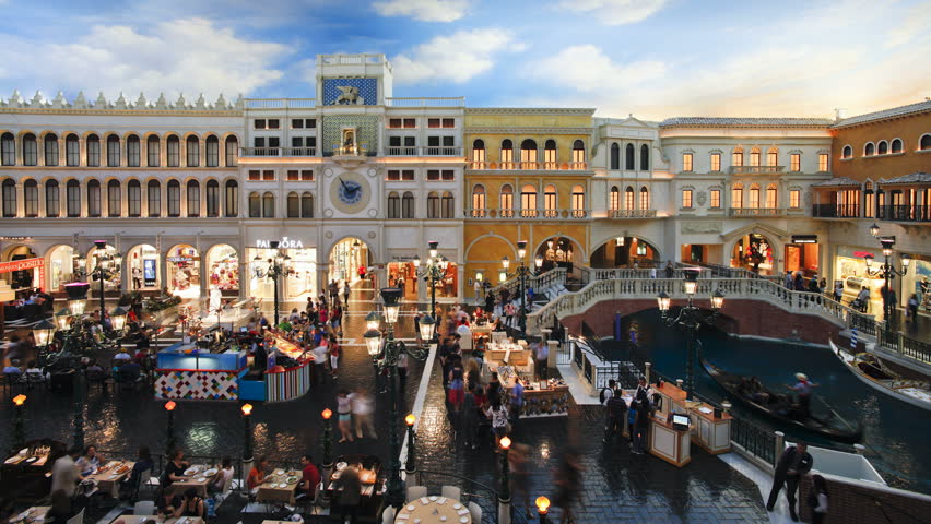 LAS VEGAS - CIRCA MAY 2011: Gondolas in the Canals of the Venetian Casino and Hotel with people.