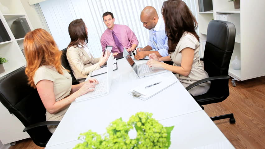 Successful advertising agency people discussing commercial client promotion