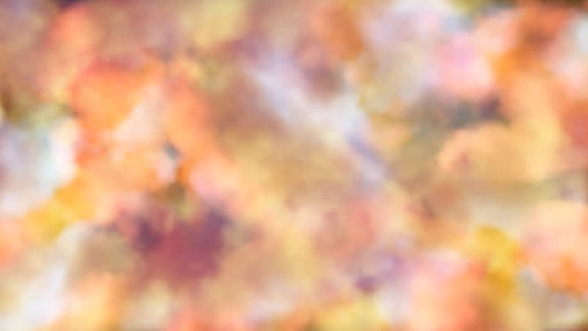 Yellow, red colors, cloud-like forms changing shape and moving.