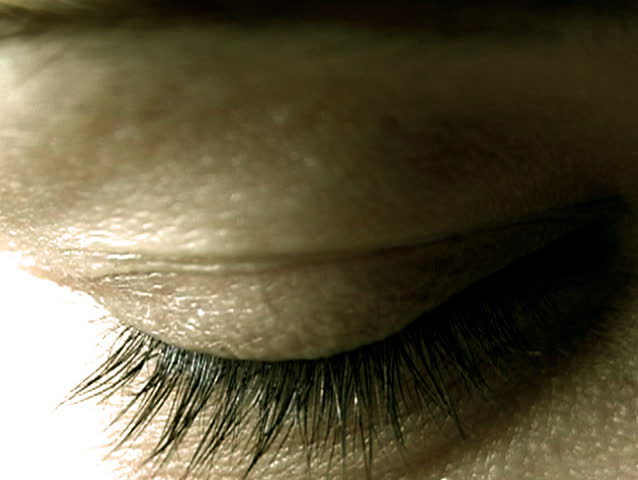 Female eye open and close in a weird manner.