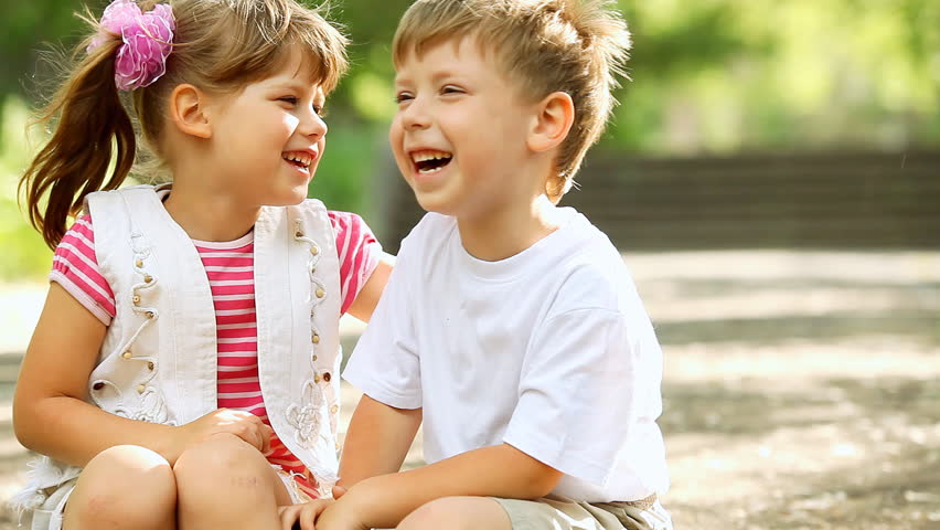 Two child funning in park, outdoors