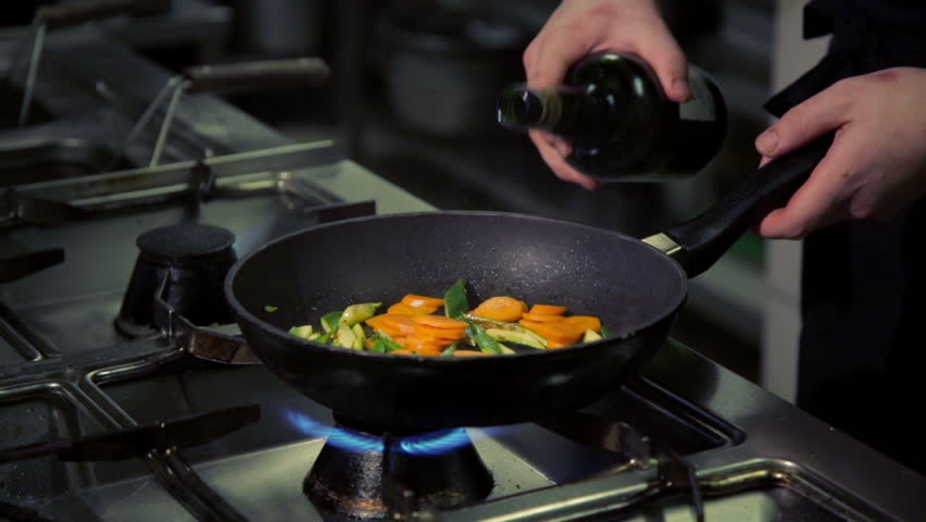 chef cook doing flambe