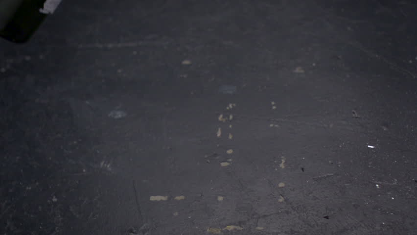 Wine bottle being smashed on floor shooting with high speed camera.