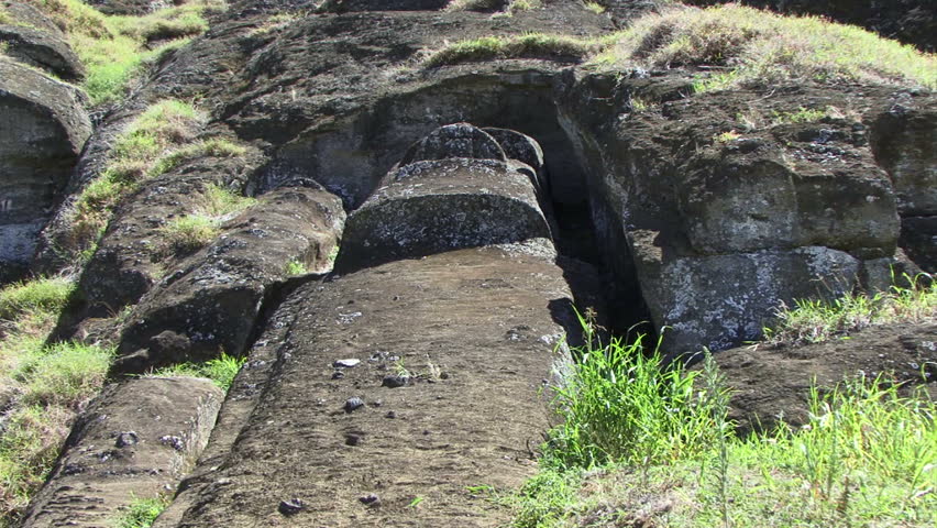 Easter Island Moai partially cut from the ground