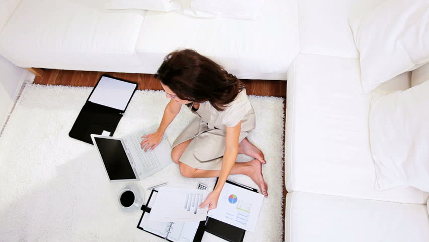 Female business women preparing documents for a deadline
