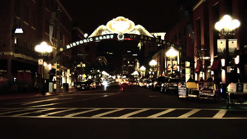 SAN DIEGO, CALIFORNIA-CIRCA 2011-Pedicab peddling tourists in downtown San Diego at night in the National Historic District in the Gaslamp Quarters in San Diego, California.