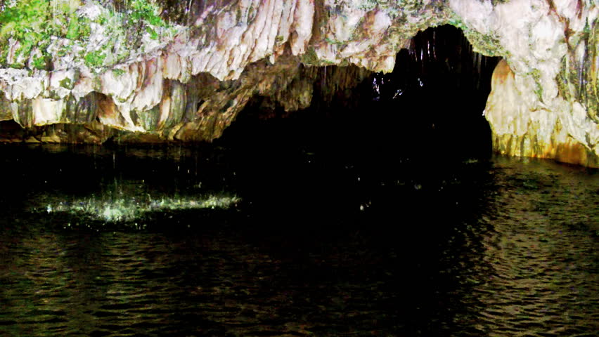 Spring water drips from the roof of a limestone underground river cave at Natural Bridges Hiking Trail near Columbia, CA. 