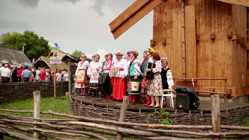 VELYKI SOROCHYNTSI, UKRAINE - AUGUST 17: Performers onstage at the Sorochyntsy Fair on August 17, 2012 in Velyki Sorochyntsi, Ukraine. This large fair has been held every year since the end of Soviet rule and was declared Ukraine's national trade fair.
