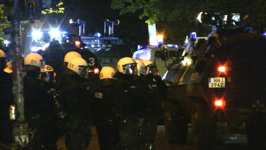 HAMBURG - CIRCA AUGUST 2012: Police operation circa August 2012 in the Schanzenviertel neighborhood of Hamburg, Germany. The peaceful Schanzenfest event ended in riots at night.