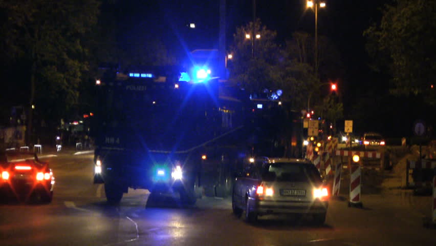 HAMBURG - CIRCA AUGUST 2012: Police operation circa August 2012 in the Schanzenviertel neighborhood of Hamburg, Germany. The peaceful Schanzenfest event ended in riots at night.