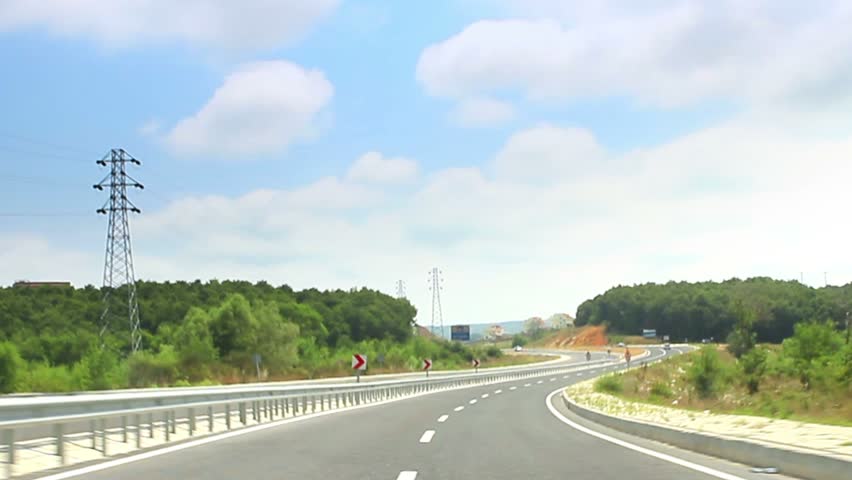 Car driving in a sunny day. Timelapse
