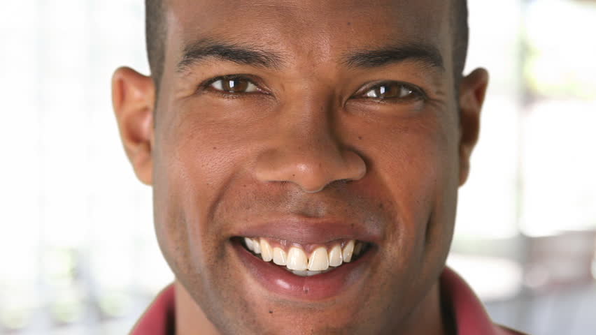 Closeup portrait of smiling African American man's face