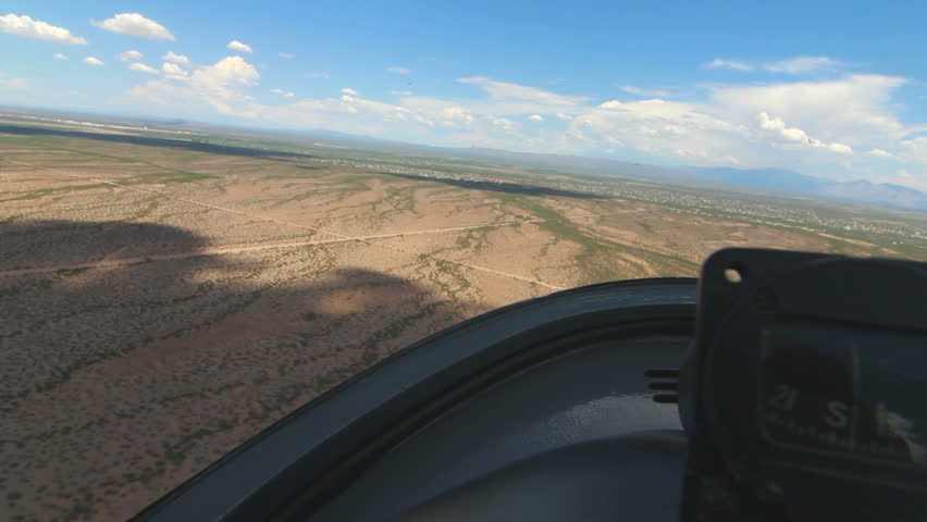 Time Lapse, Glider plane, aerial passenger POV, swoops in for a smooth landing. 1080p