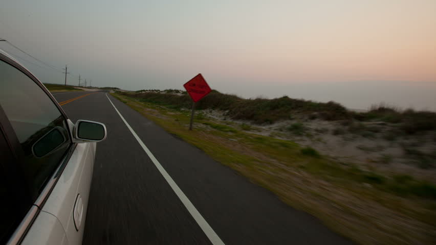 Outer Banks Driving External Vehicle Car Time-lapse video at Sunrise