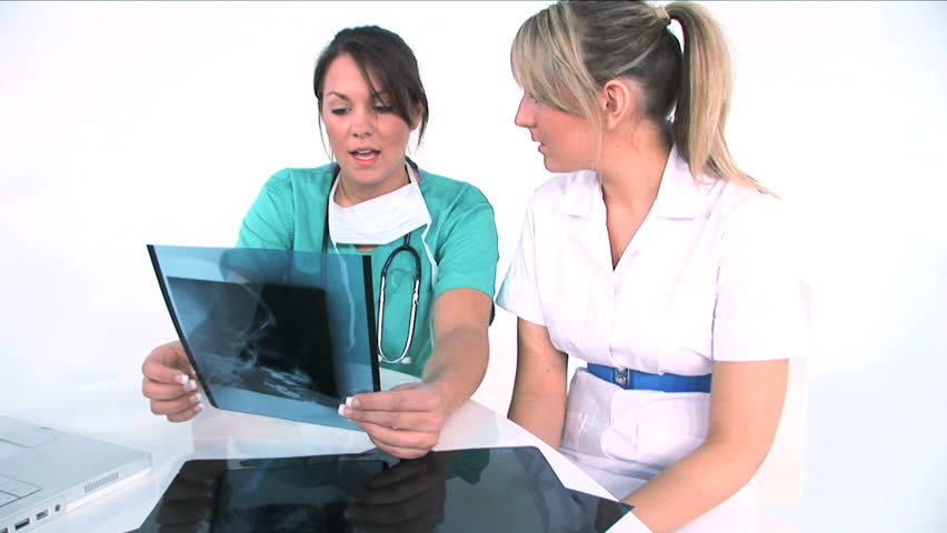 Young medical staff examining medical records