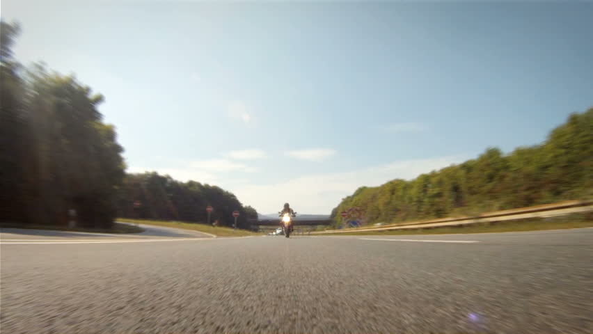 Motorcycle racing on the highway